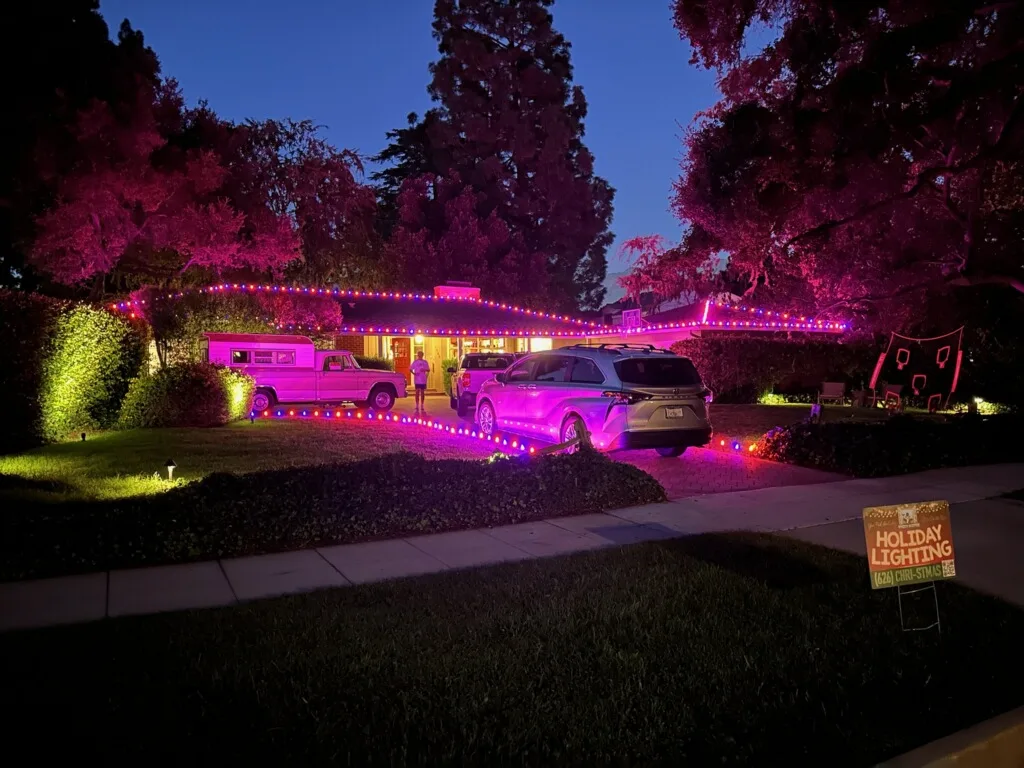 Bee Merry branded service truck on-site installing Christmas lights in the Conejo Valley